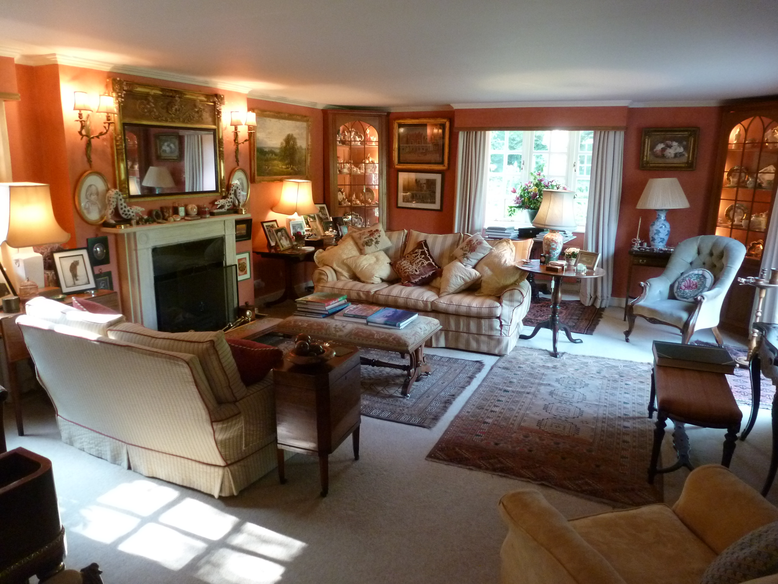 Our guests can relax in the sitting room with its log fire, fine antiques, big comfy sofas